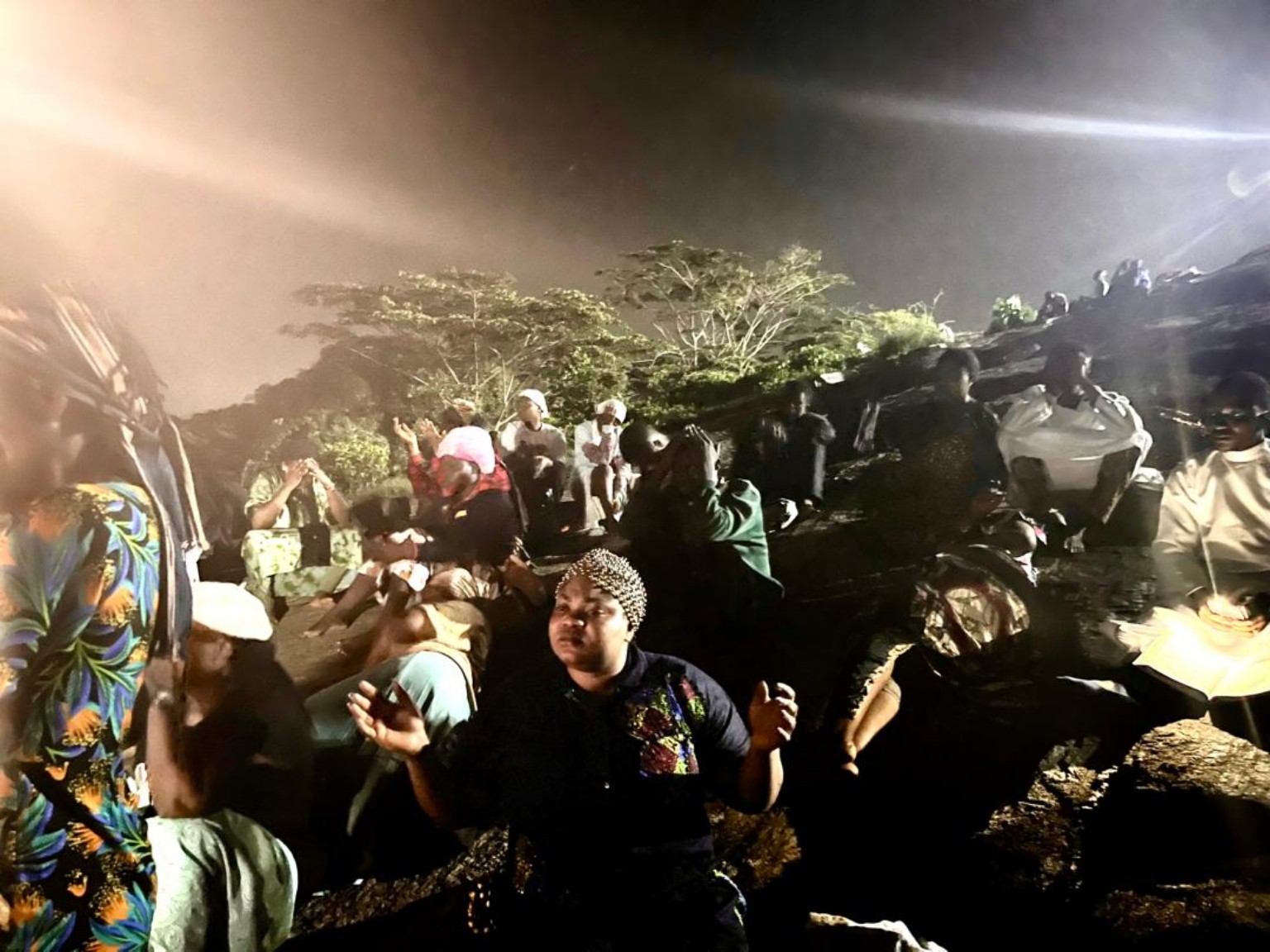 Outdoor prayer fellowship at night